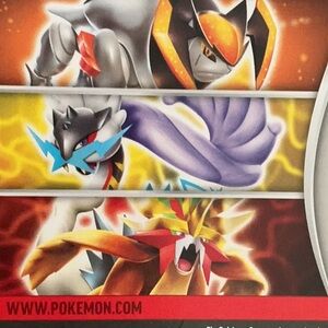 Pokemon Tin with Orange and Black with some cards.